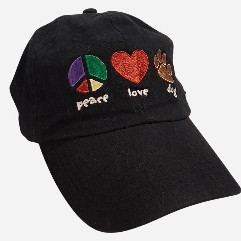 Womens black baseball cap with embroidered peace sign, heart, and paw